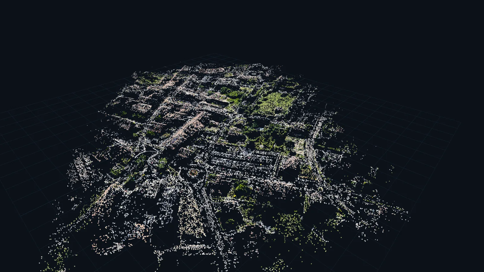 A thin sparse point cloud of the town, placed while the camera positions were solved.